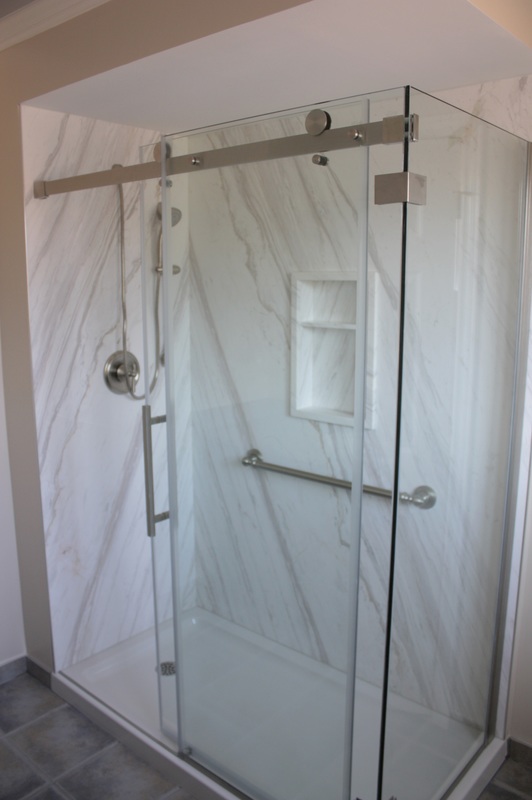 Picture Stone panel Shower, glass shower package, moen faucet, solid marble niche, designer grab bar
