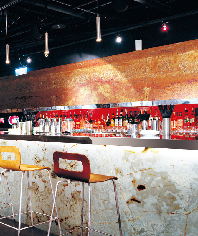 Red Travertine above bar. Picture