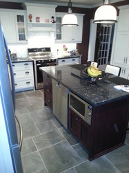 Custom Kitchen in Essa. Blue peal granite countertop.